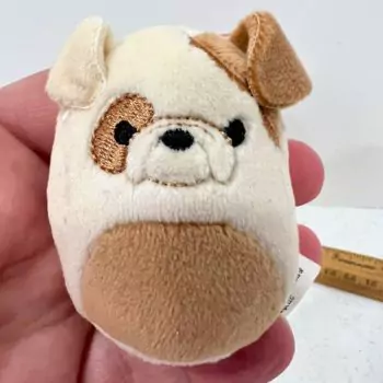 mini squishmallow brock in hands