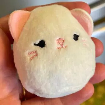 mini squishmallow kelsey in hand