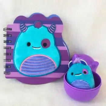 mini squishmallow rorty in mystery capsule in side of squishmallow book