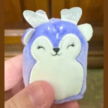 small squishmallow farryn on display in hand