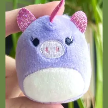 small squishmallow leanne in hand